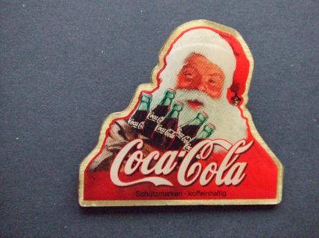 Coca Cola kerstman met vijf flesjes cola